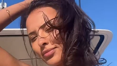 Maya Jama can't take her eyes off shirtless boyfriend Ruben Dias as she shares 'perv cam' snap of the footballer during romantic boat trip