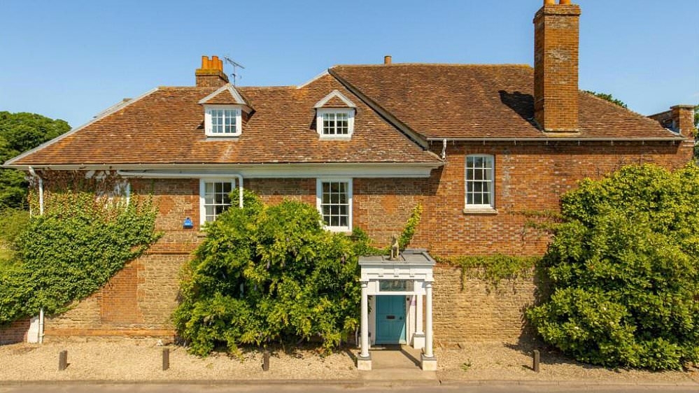 So much for the gothic vibes! Tim Burton puts mansion on sale for £4.5m...but shocks fans with quintessentially English decor