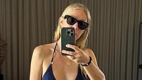 Gwyneth Paltrow flaunts her svelte figure in bikini-clad selfie as she models clothing from her Goop brand - after she was accused of 'faking PR story' about infamous 'vagina' candle