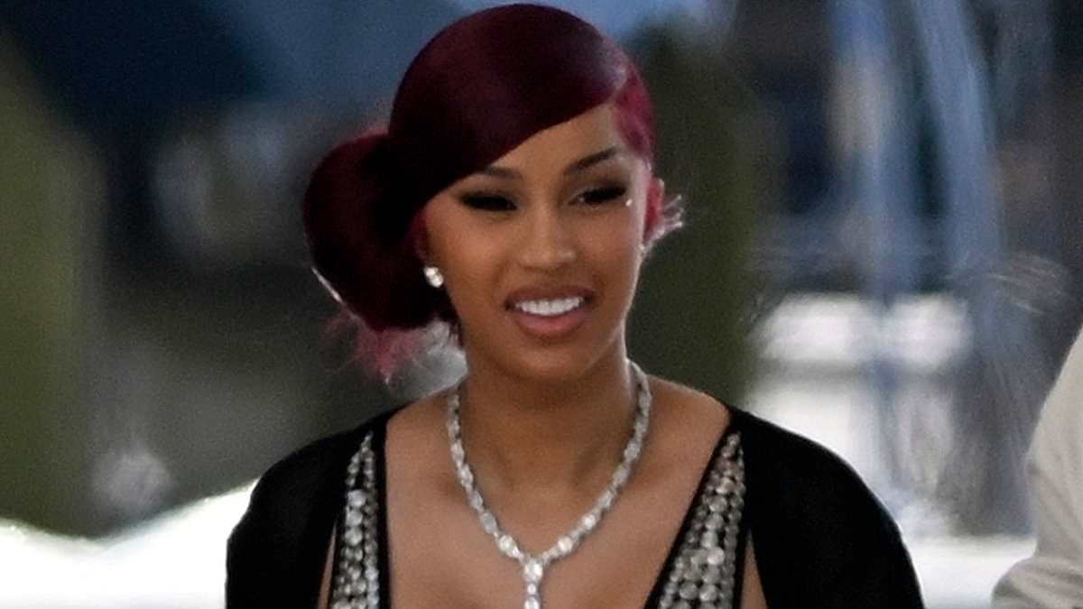 Cardi B nearly suffers a nip slip in a skimpy swimsuit before beau Stefon Diggs comes to the rescue