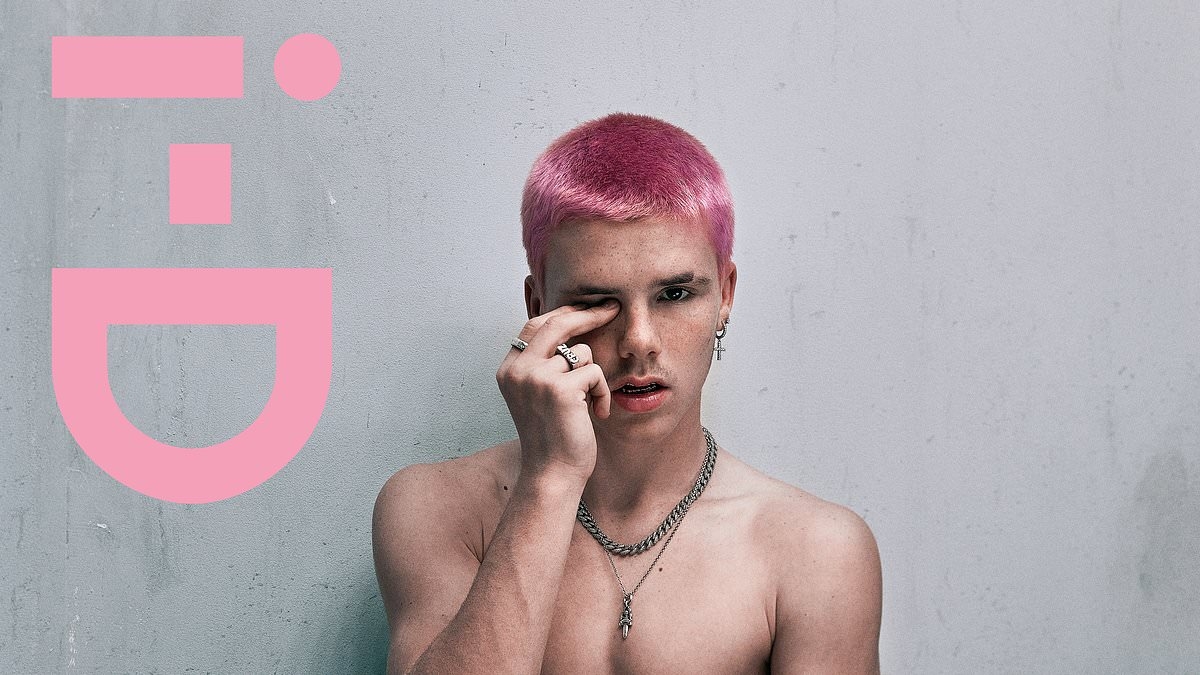 Cruz Beckham accidentally reveals he has a shirtless photograph of himself hanging in his bedroom