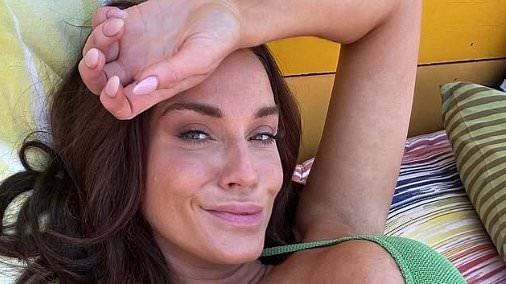 Vicky Pattison puts on a busty display in a green bikini as she soaks up the sun in Monaco during Grand Prix weekend