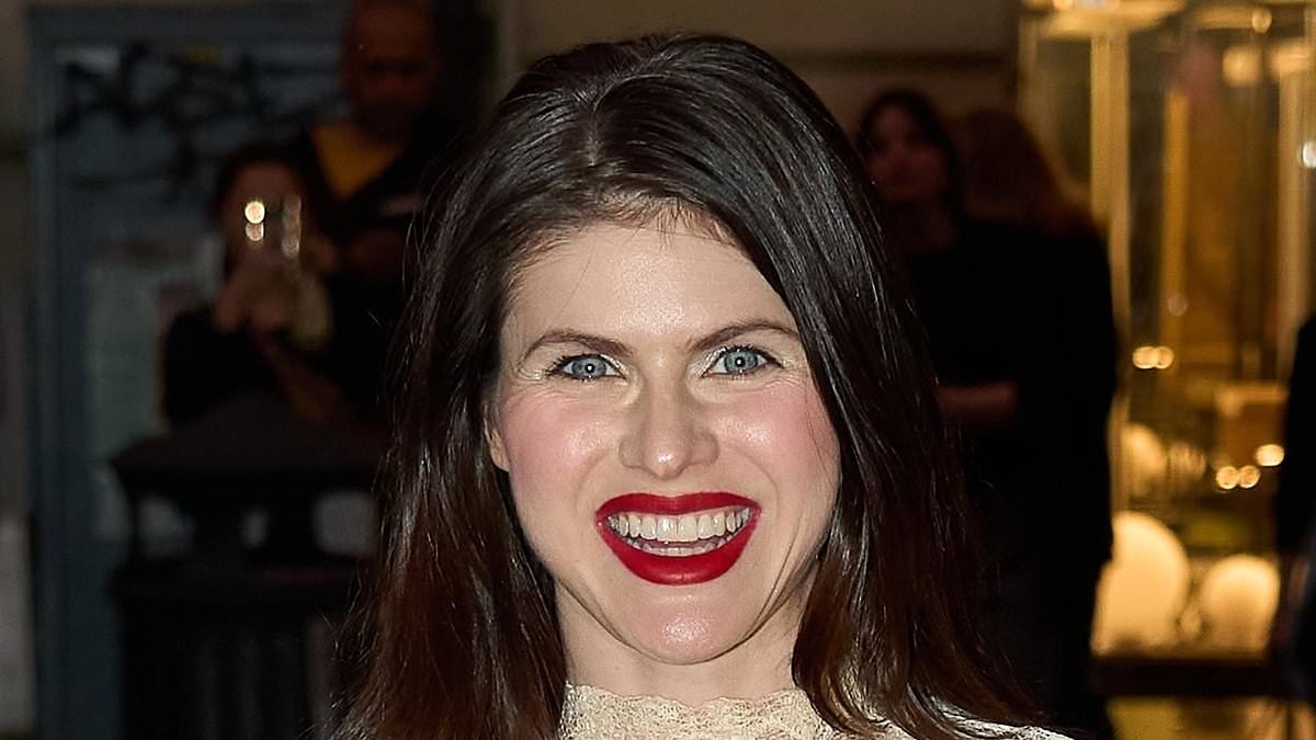 Alexandra Daddario leaves very little to the imagination in a sheer lace gown as she arrives at the Dior Cruise show in Rome