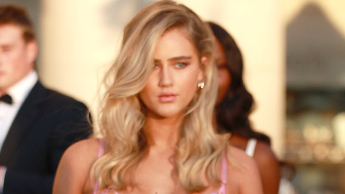 Influencer causes a scene as she struts along busy Sydney Harbour tourist strip in VERY skimpy lingerie joined by half naked models in stunt for Léays underwear launch