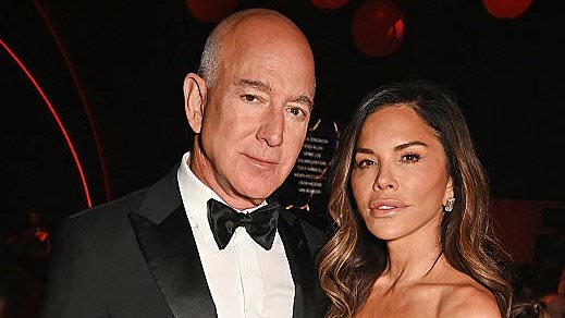 Lauren Sanchez nearly spills out of plunging dress as she dines in Italy with Jeff Bezos and her son Nikko