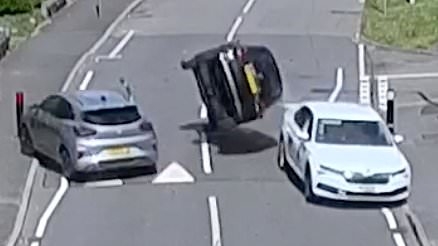 Astonishing moment drunk driver flips his car on its side before driving away - as he is jailed for 14 months