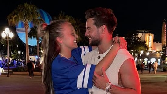 Chris Hughes reveals his relationship status with JoJo Siwa as he gushes she's become his 'favourite human' after she confirmed their romance