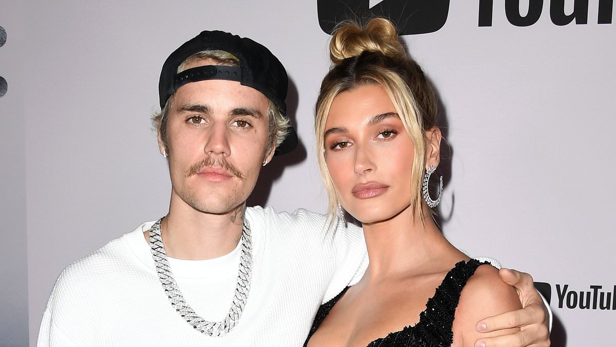 Fans tell Hailey Bieber to divorce Justin and protect her fortune after she lands BILLION-DOLLAR Rhode deal... and he reacts VERY coolly
