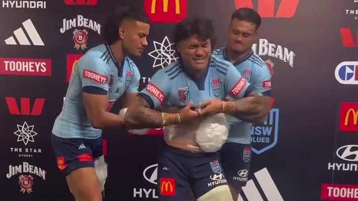 See the heartwarming moment State of Origin star Brian To'o's baby son sticks up for him when he's 'bullied' by his teammates