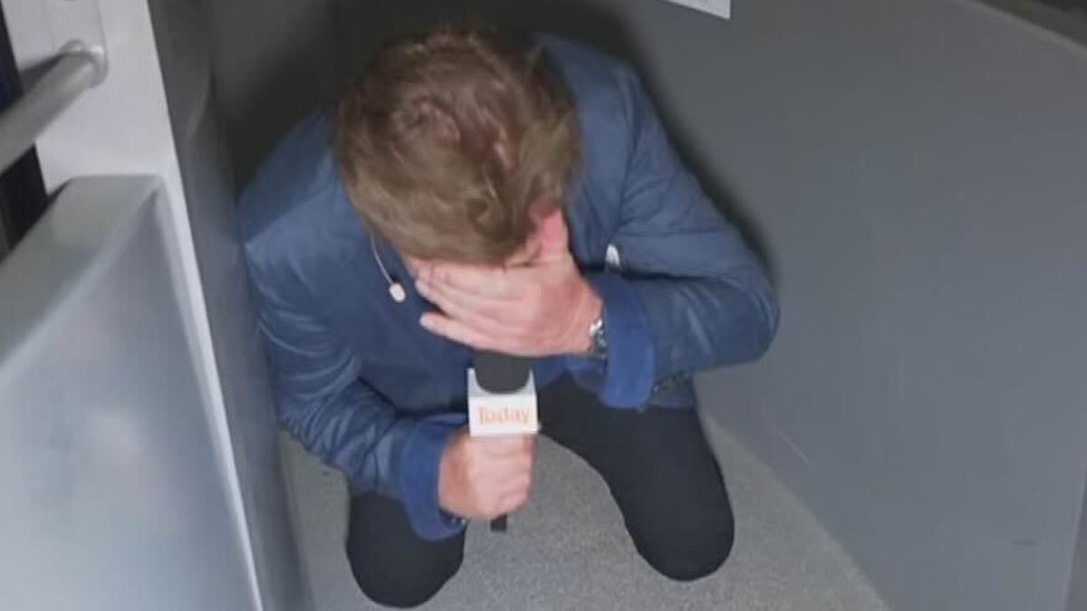 Richard Wilkins cowers and covers his face as he conquers his greatest fear during Today show broadcast in Dubai
