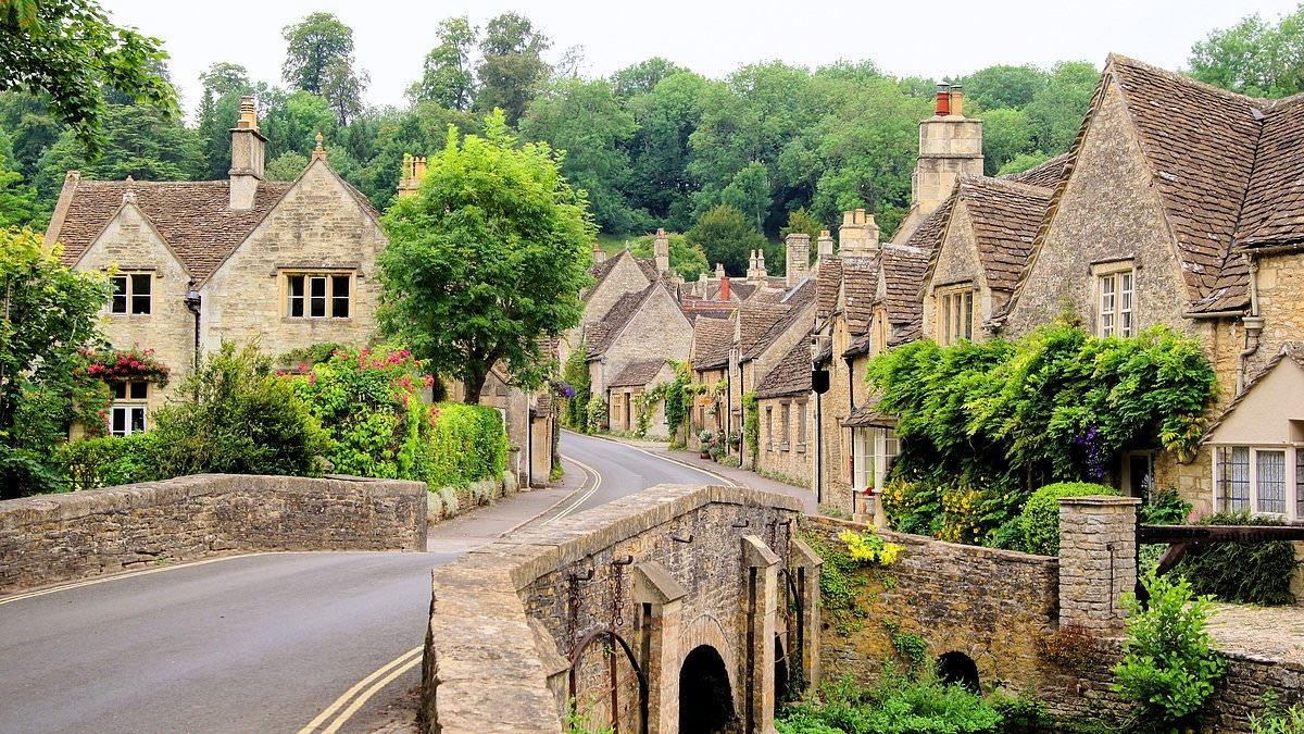 Drone wars break out in England's prettiest village: Locals call in police as tourists' eyes-in-the-sky buzz over their homes to photograph the stunning locale