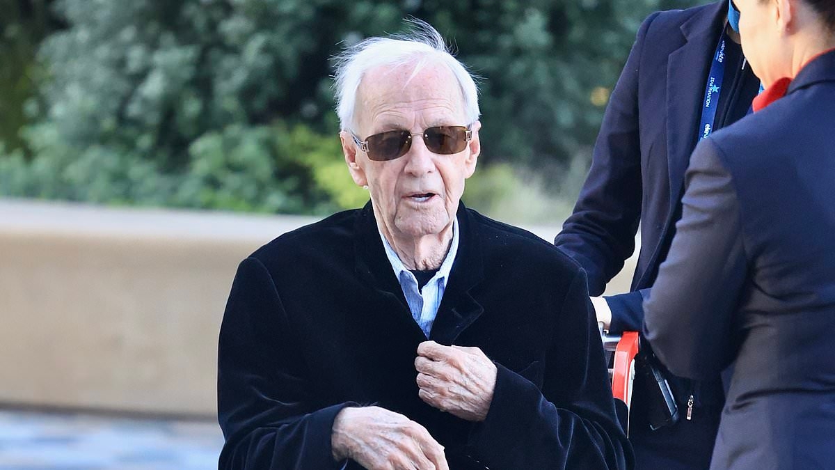 A frail Paul Hogan, 85, is pushed along in a wheelchair as he returns home to Australia amid rumours the icon is moving back Down Under for good