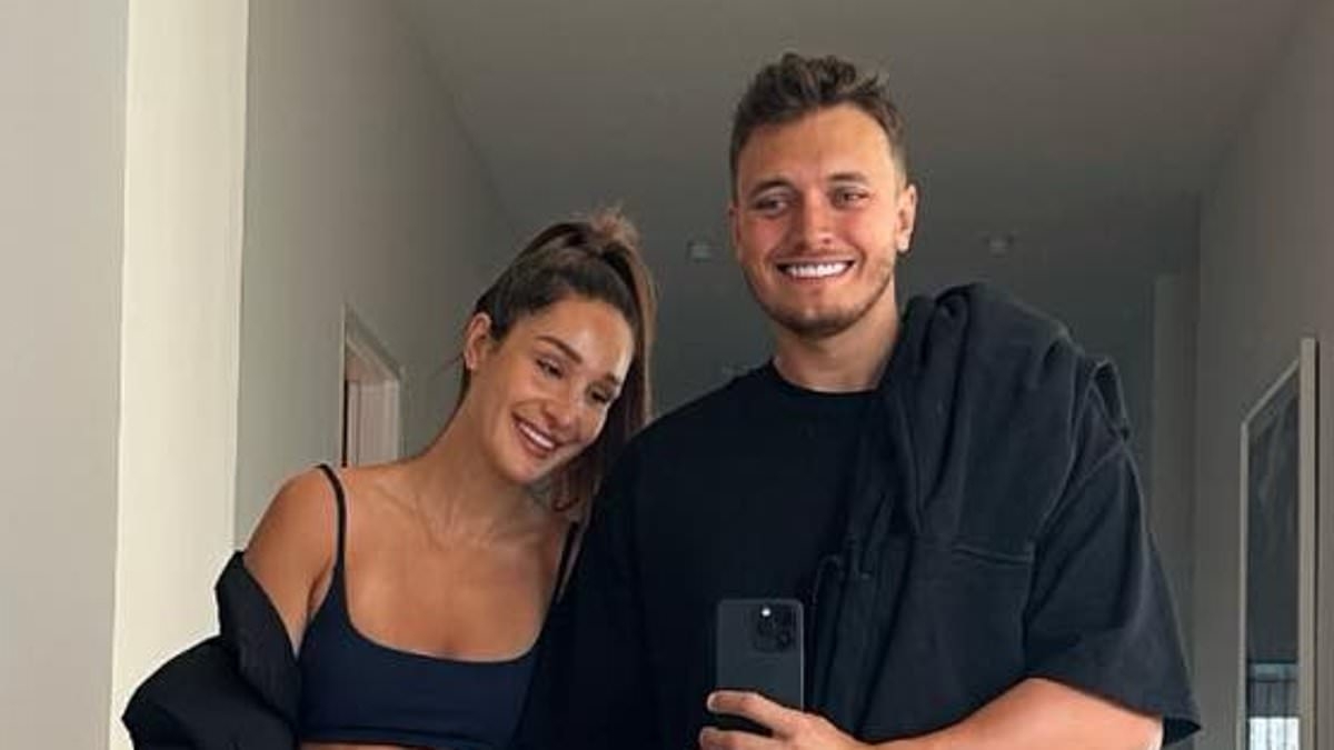Influencer Kayla Itsines' husband Jae Woodroffe responds to concerns about their giant Doberman 'protection dog' being around their young children