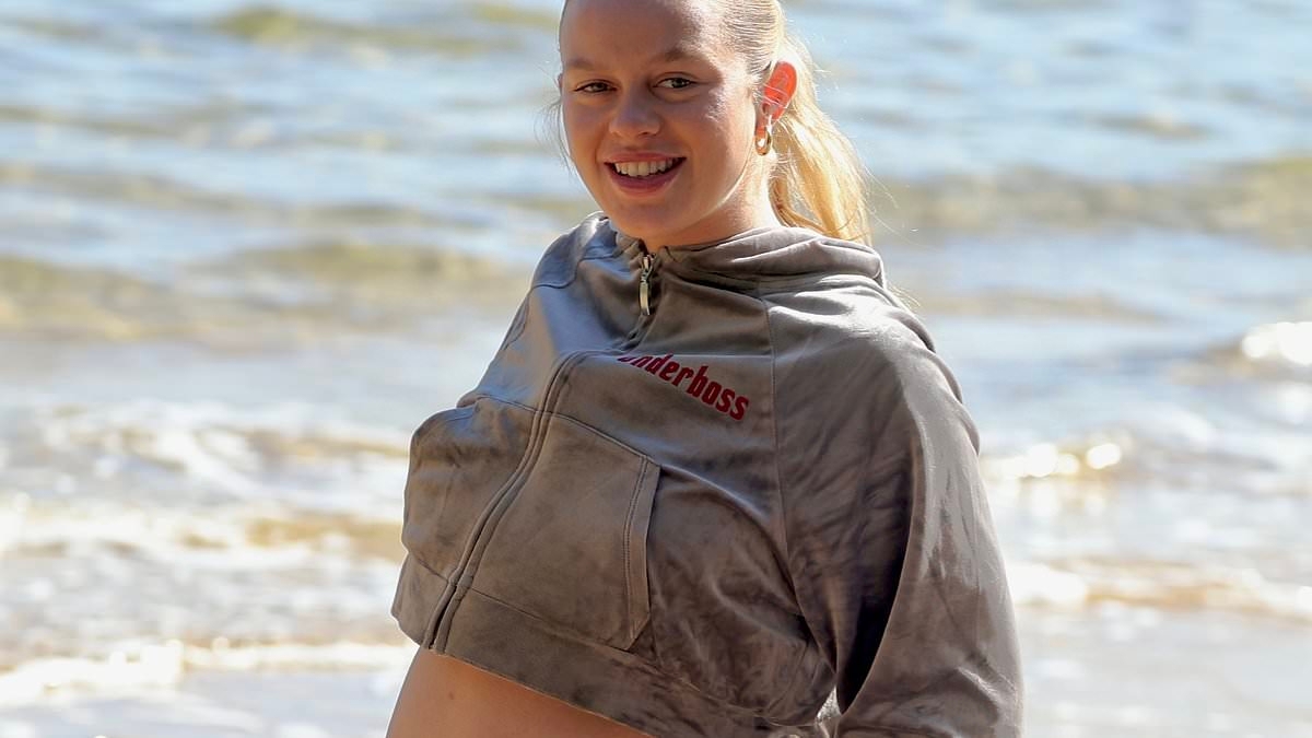 Any day now! Madeline Holtznagel flaunts her huge baby bump as she arrives at Justin Hemmes' mansion before being affectionately piggybacked by the billionaire