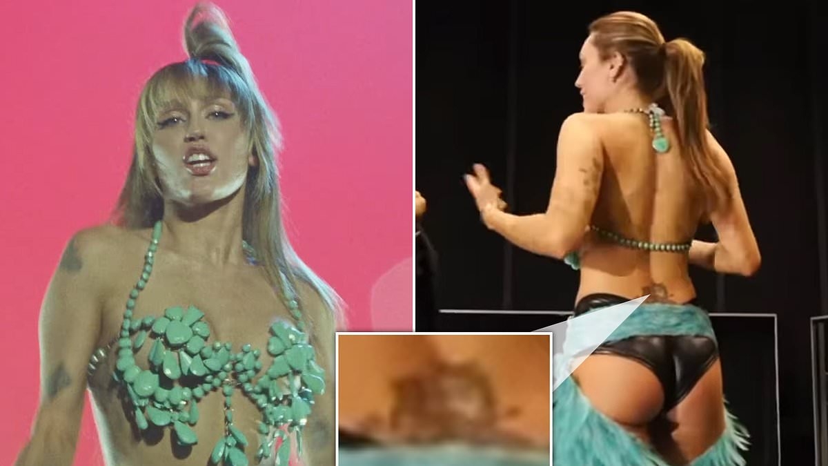 Miley Cyrus goes low in her sexy new music video and shows off her lower back's tiger tattoo