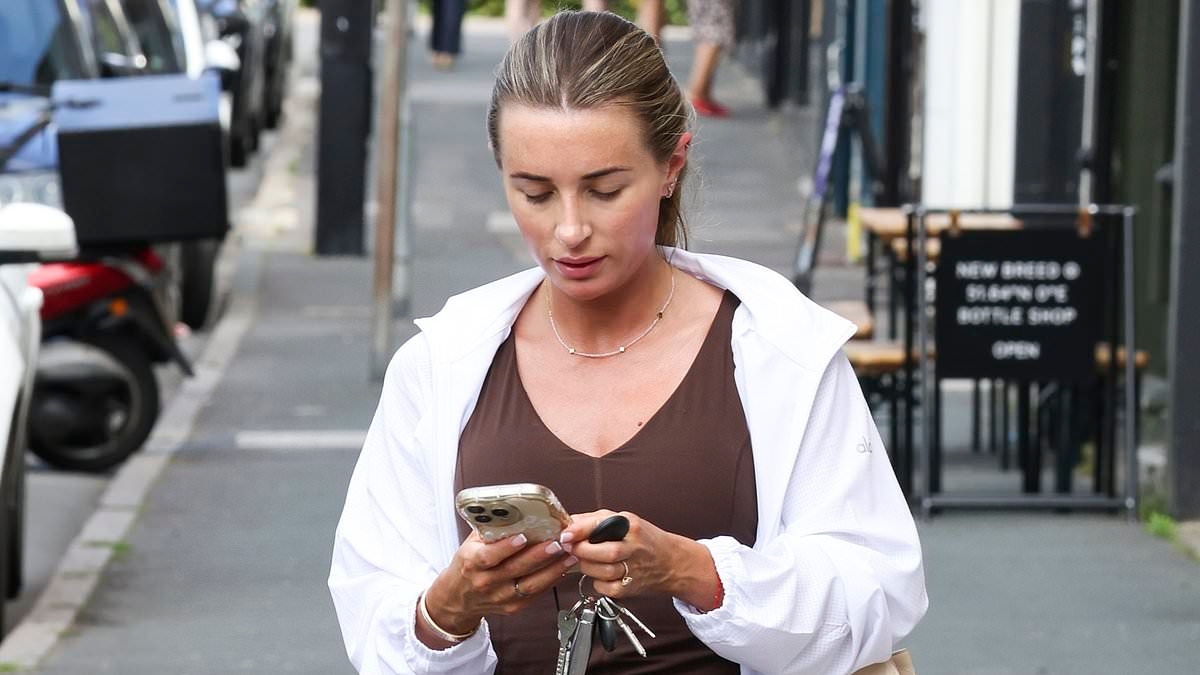 Bride-to-be Dani Dyer is glued to her phone as she heads to the salon amid final preprations just days ahead of her lavish wedding to Jarrod Bowen