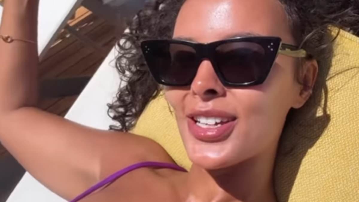 Maya Jama flaunts her jaw-dropping figure in a TINY purple bikini amid her romantic getaway with boyfriend Reuben Dias - after sharing first ever snap with the hunky footballer