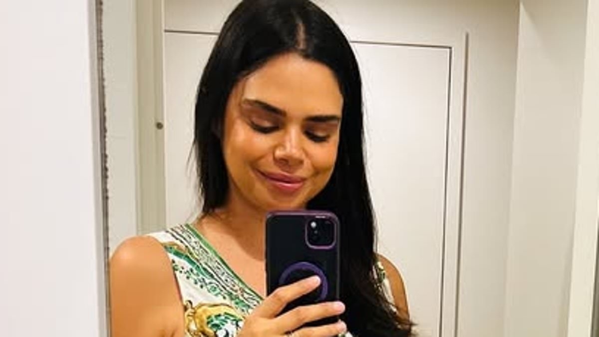 Model Samantha Harris flaunts her baby bump for the first time since announcing her pregnancy with husband Luke Hunt
