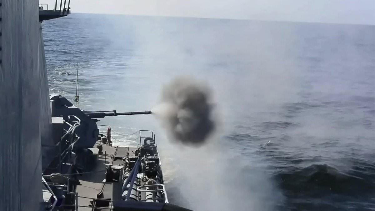 Putin stages major war games on NATO's doorstep as submarine fires torpedoes at mock Western ship and Russia vows to conduct 'dozens' more naval drills this summer
