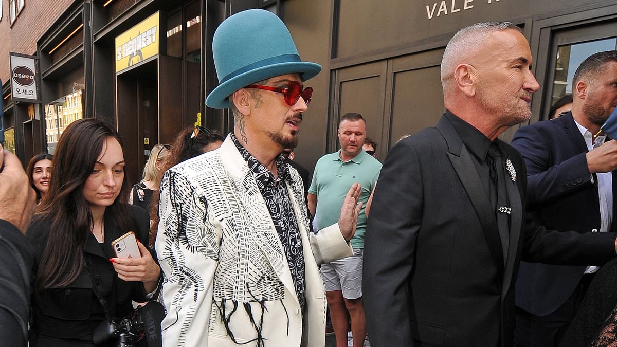 Fat Tony's wedding kicks off in style as DJ, 58, arrives flanked by longtime pal Boy George for his London nuptials before exchanging vows with Stavros Agapiou, 32