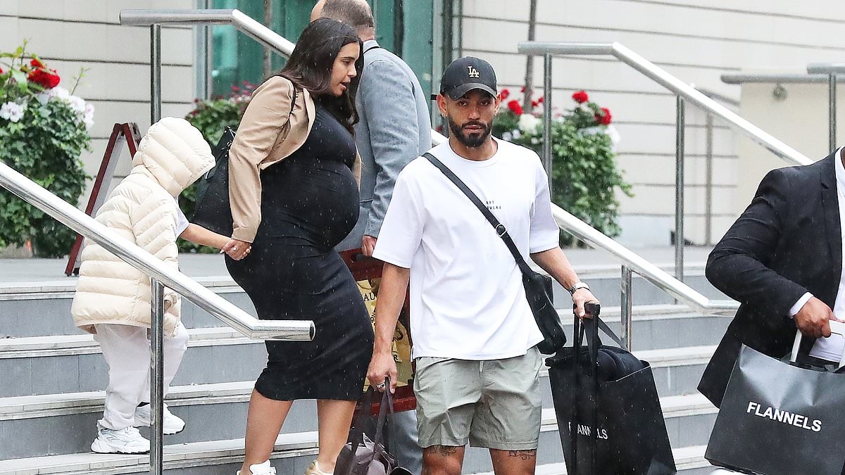 Man United's saviour signing arrives: £62.5m Matheus Cunha is spotted at Manchester's Lowry Hotel with his heavily pregnant wife as he prepares to seal transfer to crisis club