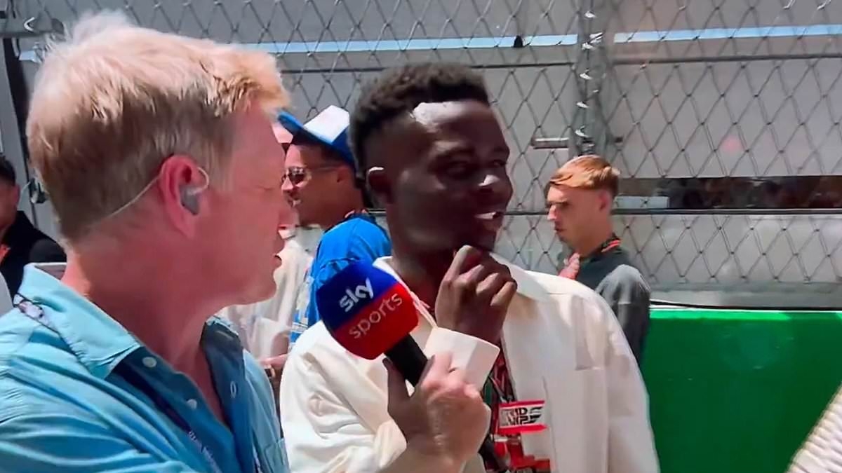 Bukayo Saka is called out for 'arrogant' F1 gridwalk behaviour after four-word TV interview response on England team's bonding day out in Barcelona
