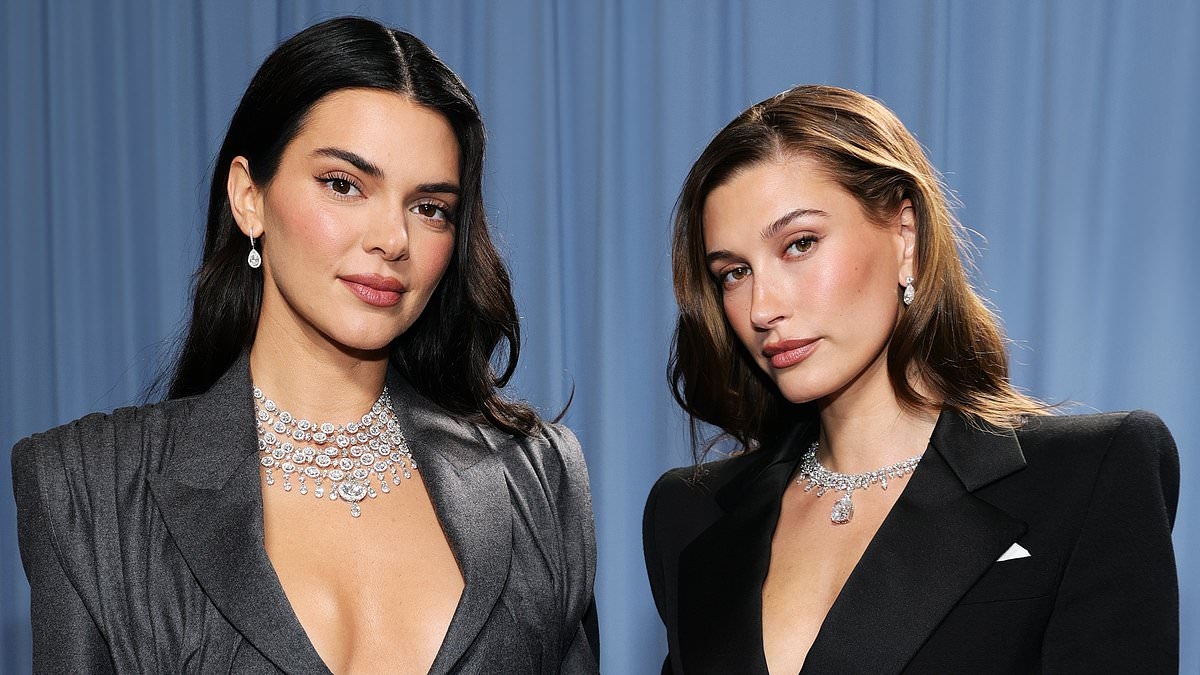 Hailey Bieber flips middle finger at Kendall Jenner and flashes paintball gun in wild showdown