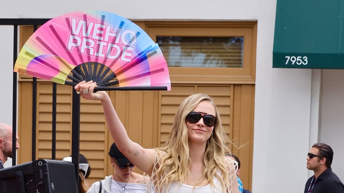 Cara Delevingne flaunts her incredible abs in crop top as she parties with pals at WeHo Pride Parade