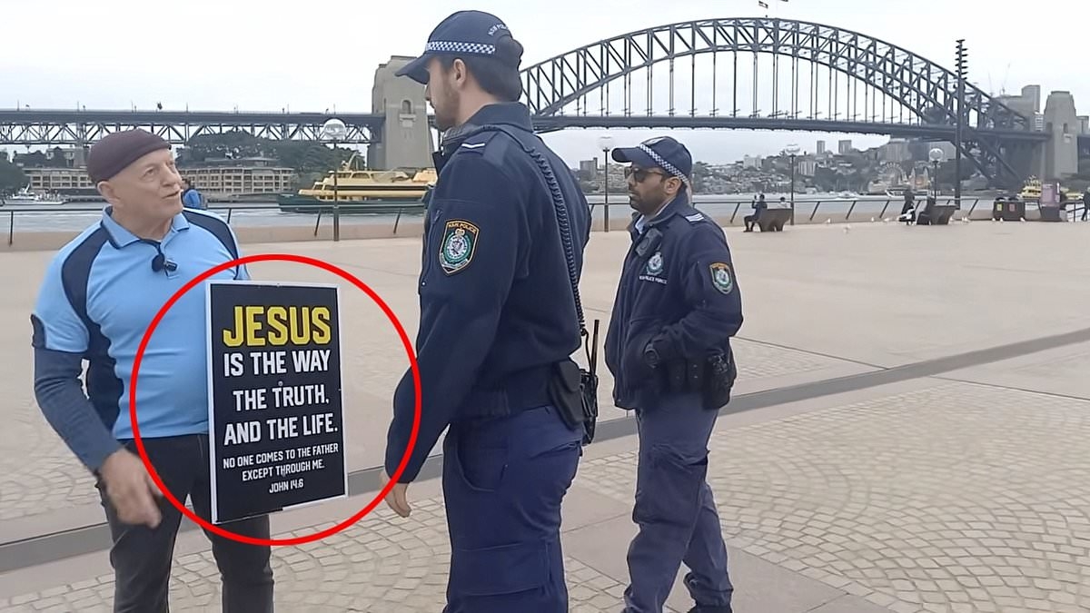 Wild reason street preacher is told by cops to move on after walking around the Sydney Opera House: 'Are you going to arrest me?'