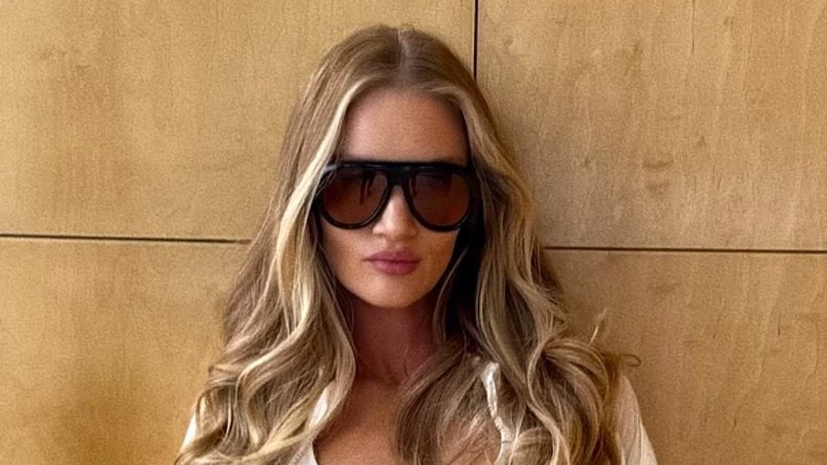 Rosie Huntington-Whiteley stuns as she shows off her ripped abs in all-white sportswear look as she models for Alo Yoga