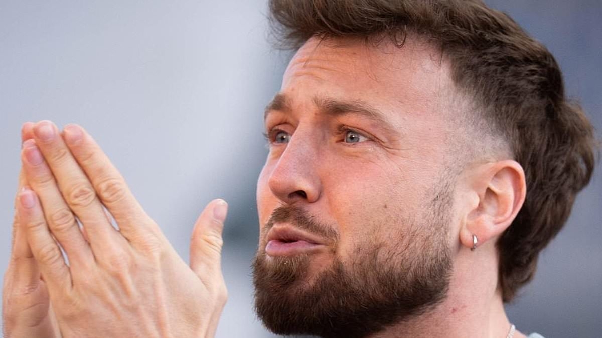 Sam Thompson grimaces during first day of gruelling Soccer Aid challenge as his family pay tribute to his 'strength and resilience' after 'tricky' split from Zara McDermott