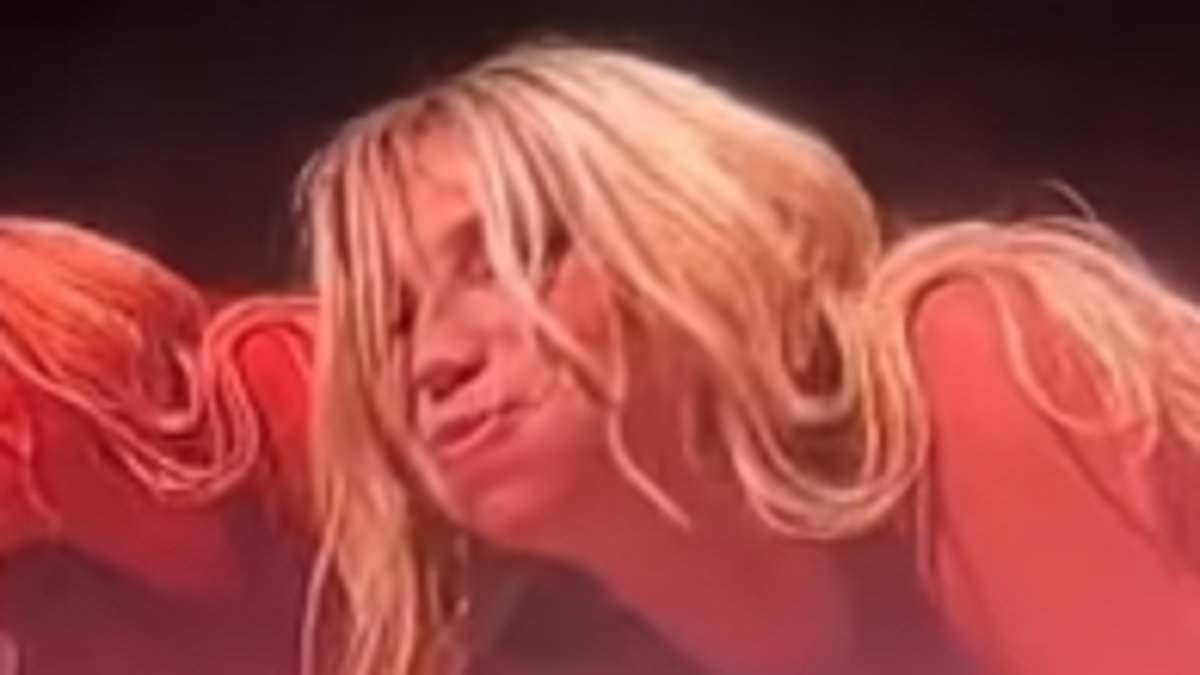 Kesha sparks storm of criticism for eating a banana between backing dancer's legs in 'vulgar' performance