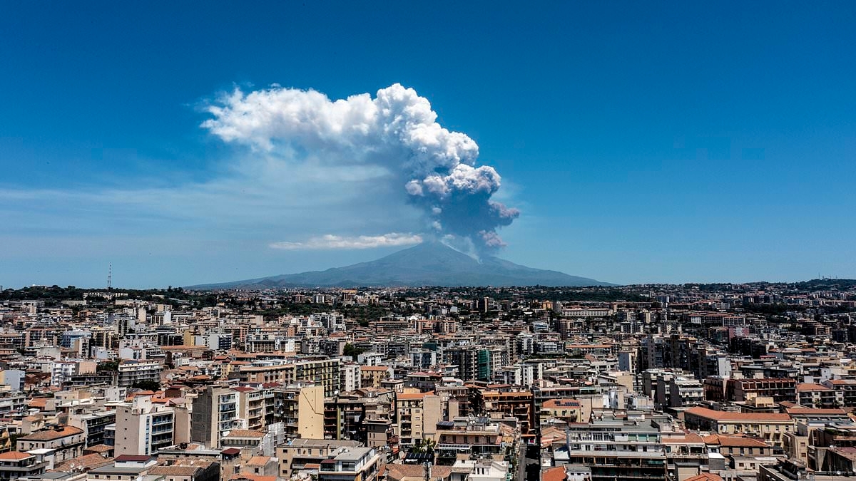 Mount Etna erupts, sending tourists fleeing to safety