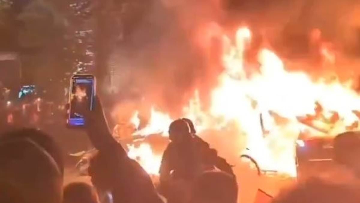Inside the 'uncontrollable' PSG Paris riots: Shocking videos reveal terrifying scenes of cars attacked and burned, shops looted and 491 people arrested