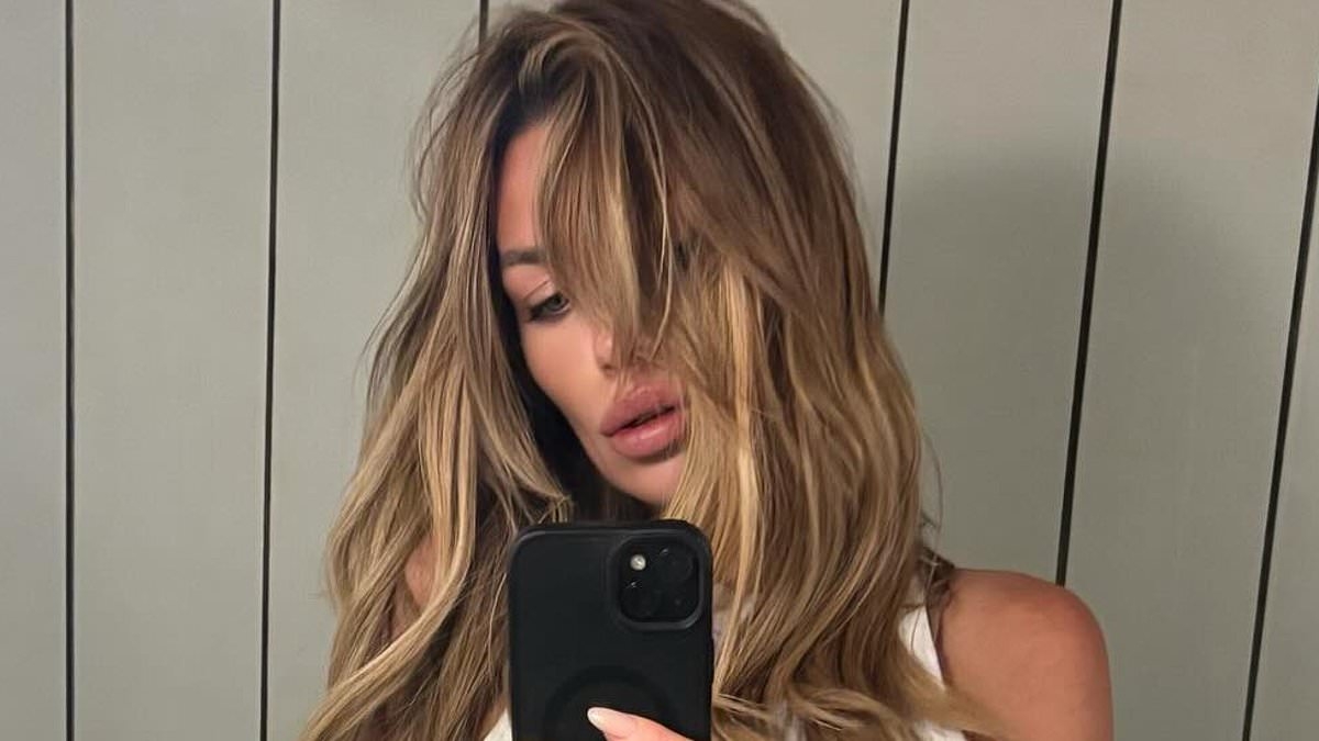 Abbey Clancy flaunts her incredibly toned abs in a skimpy crop top for steamy selfie after hitting the gym