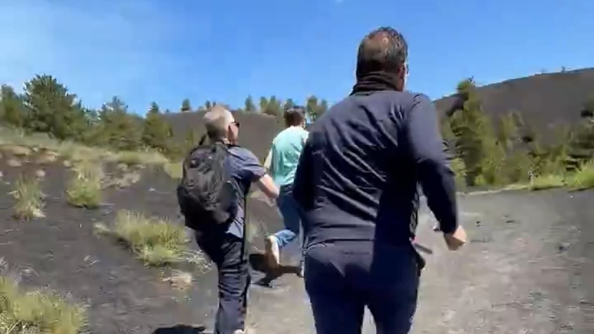 EXCLUSIVE Terrifying moment American tour group dodges Mt. Etna eruption after guide told them there was 'no danger'