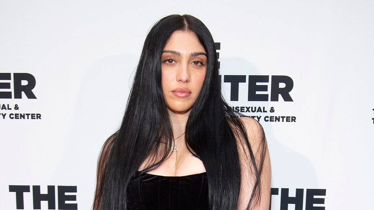 Lourdes Leon looks effortlessly chic in a black velvet midi dress as she poses with pal Dawn Lombardi at an LGBTQ fashion dinner
