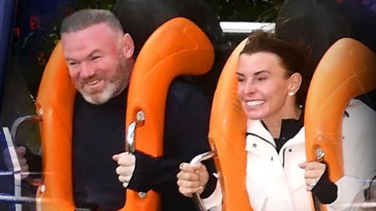 A change from the managerial rollercoaster! Wayne Rooney enjoys a day out at Alton Towers with wife Coleen and his two youngest sons