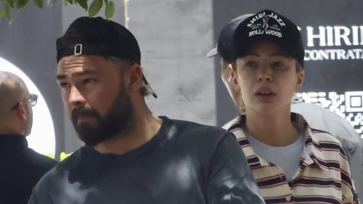 Olivia Attwood puts on a leggy display in an oversized sweater and hotpants as she enjoys afternoon of shopping in Miami with husband Bradley Dack