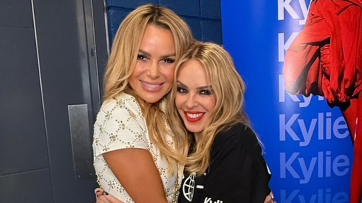 Amanda Holden poses with 'BFF' Kylie Minogue backstage after her Tension Tour at London's O2