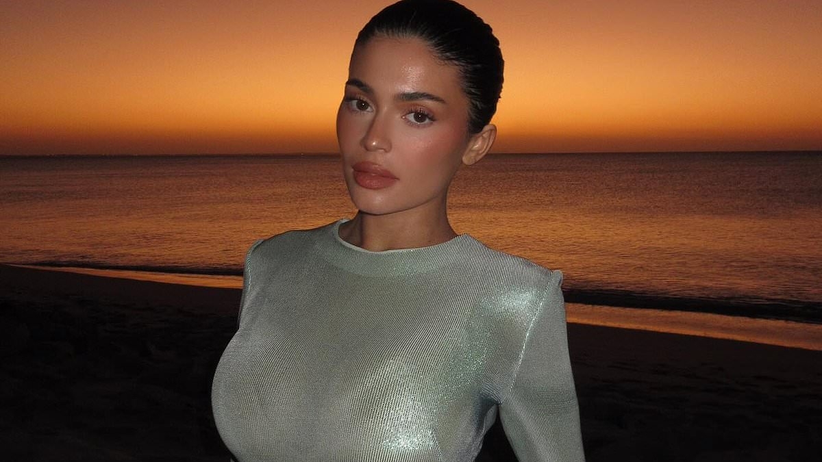 Kylie Jenner flashes her surgically-enhanced chest in skintight gown… after revealing specific details on implants