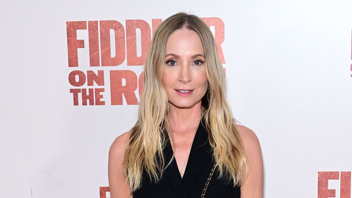 Joanne Froggatt looks chic in a black dress as she joins Ranvir Singh at the Fiddler on the Roof musical press night
