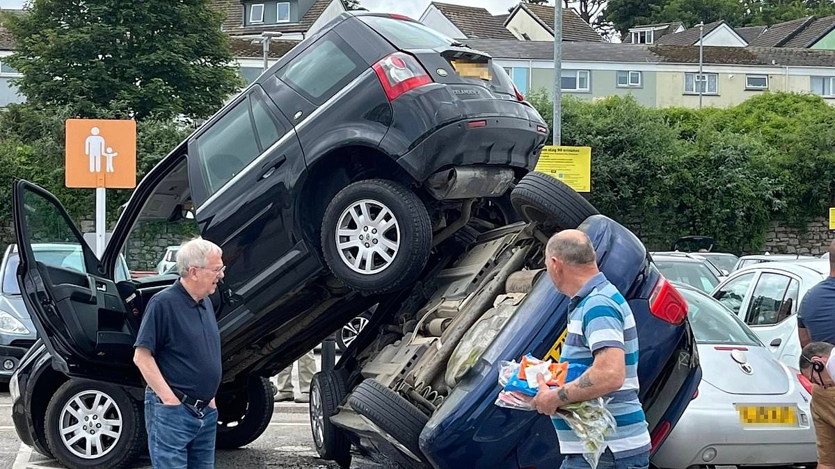 You can't park there! Land Rover ends up on top of another vehicle after Sainsbury's supermarket car park crash
