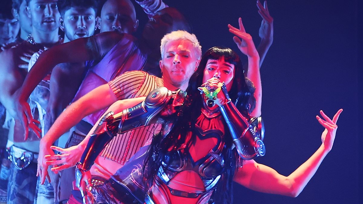 Katy Perry is joined on stage by young fans and Left Shark as she kicks off Australian tour in Sydney - with some lining up for five hours to see the show