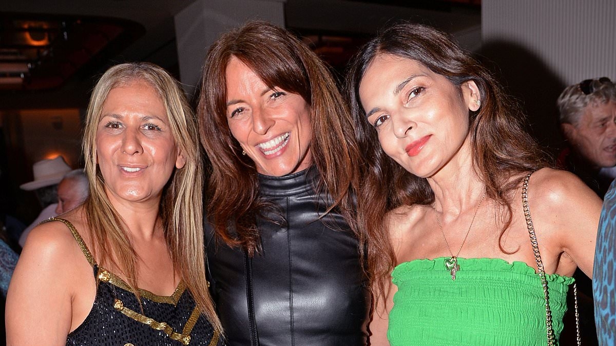 Davina McCall, 57, stuns in a sexy black leather mini dress as she parties with the likes of Patsy Palmer at Sam McKnight's glamorous 70th birthday