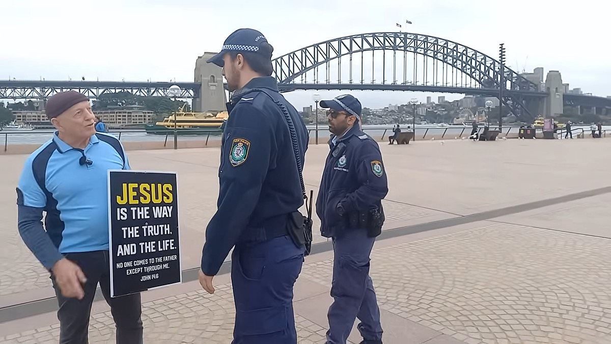 Israel Folau slams cops for stunning act with man holding up a sign about Jesus - and says it wouldn't have happened if he was promoting gay pride
