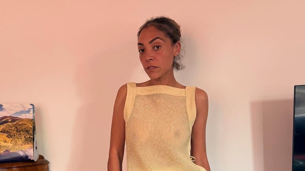 Braless Miquita Oliver, 41, turns heads in a sheer knitted mini dress while posing for racy snaps