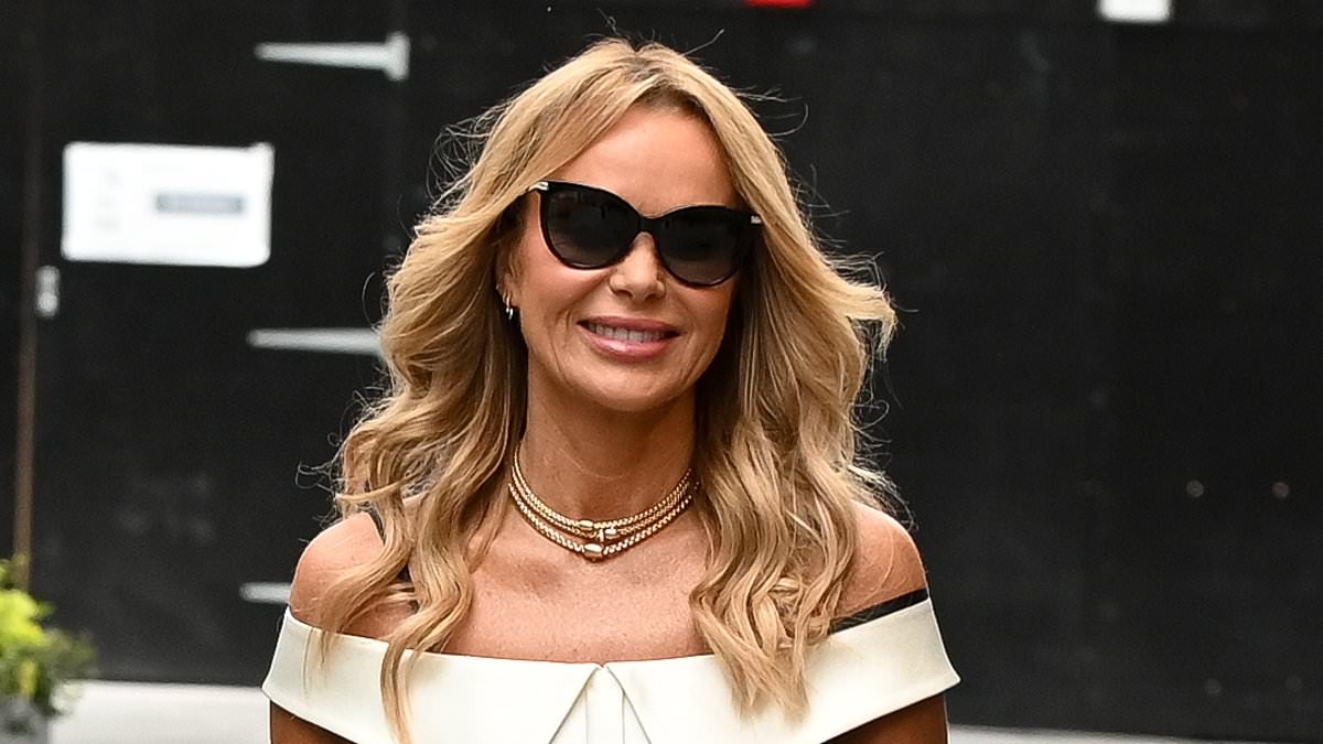 Amanda Holden puts on a VERY leggy display in a chic black-and-white mini dress as she arrives at Heart FM studios