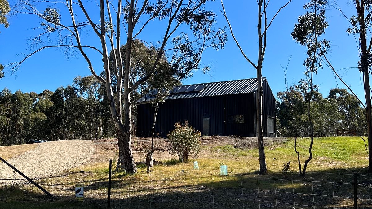 It looks like a big country shed. For one savvy Aussie couple it's their dream home - and it all makes sense when you step inside (and learn the $365k price tag)