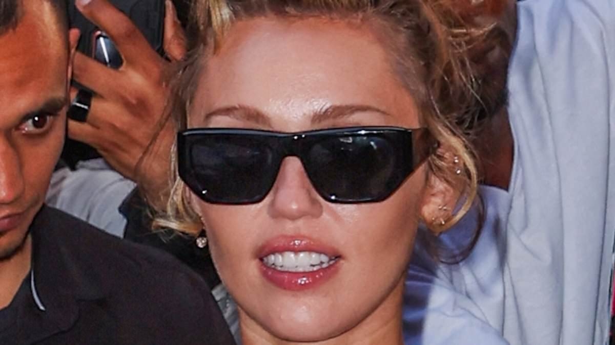 Miley Cyrus frees the nipple in plunging SHEER gown as she makes thinly-veiled dig at a famous ex